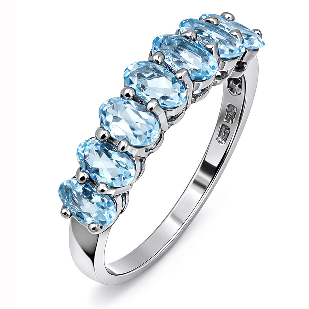 Sept Oval Blue Topaz Ring