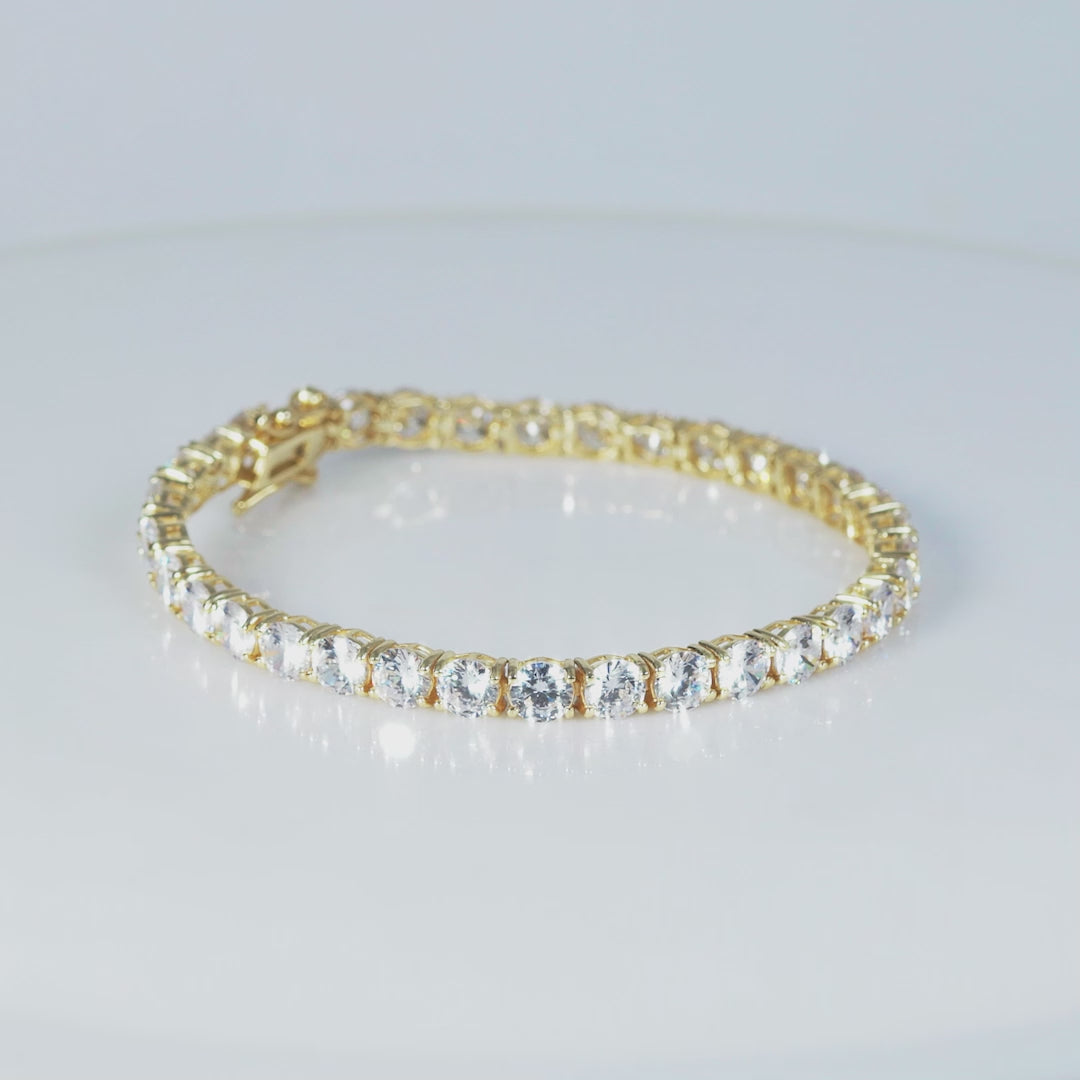 Load video: 925 Sterling Silver 18K Gold Plated White CZ Classic Tennis Bracelet For Women