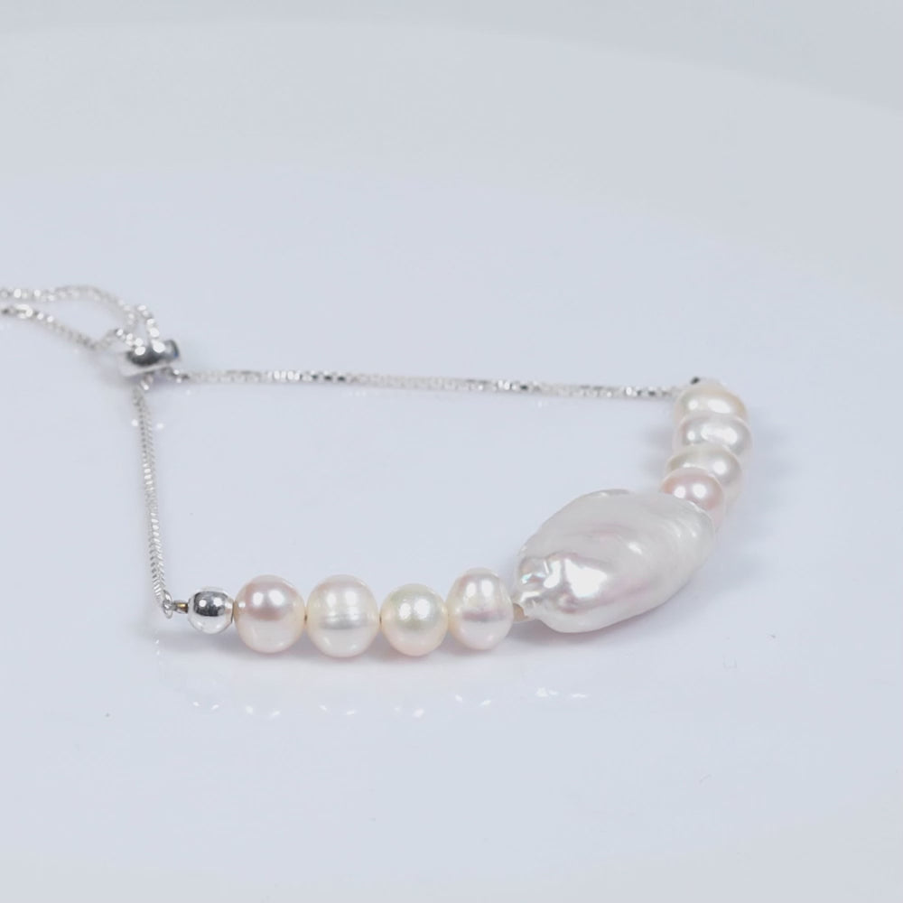 Load video: 925 Sterling Silver Fresh Water Pearl Milky Pearl Adjustable Bracelet